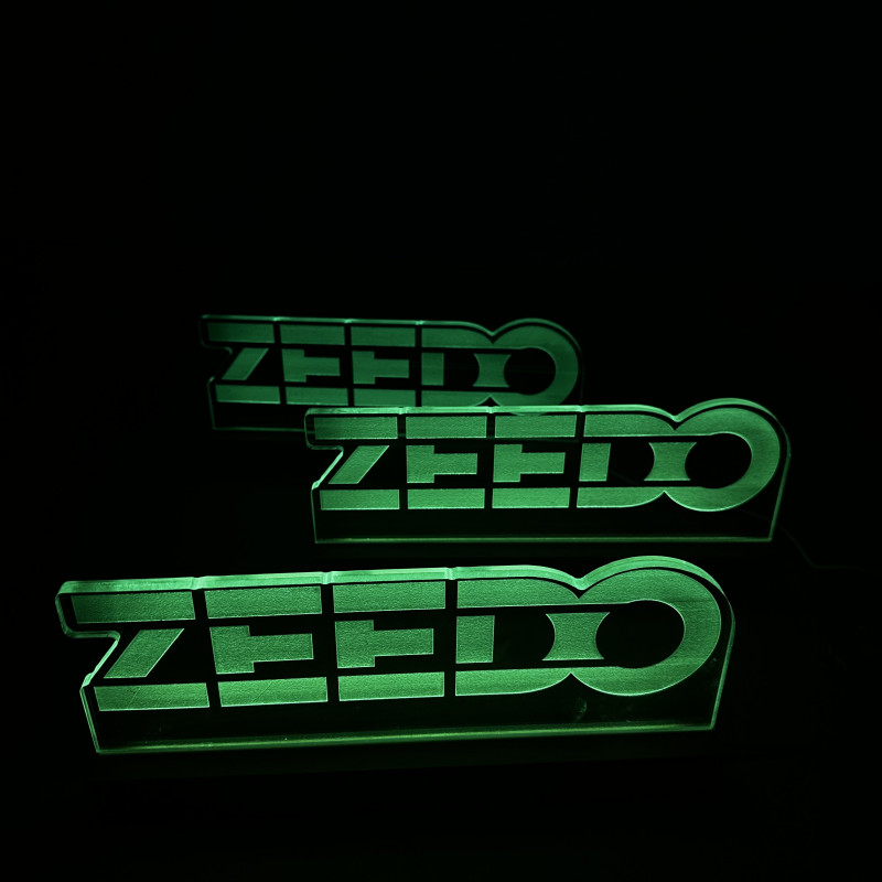 Zeedo Shop lighted totems — frosted acrylic engraving, wooden base (desk/trophy signage)